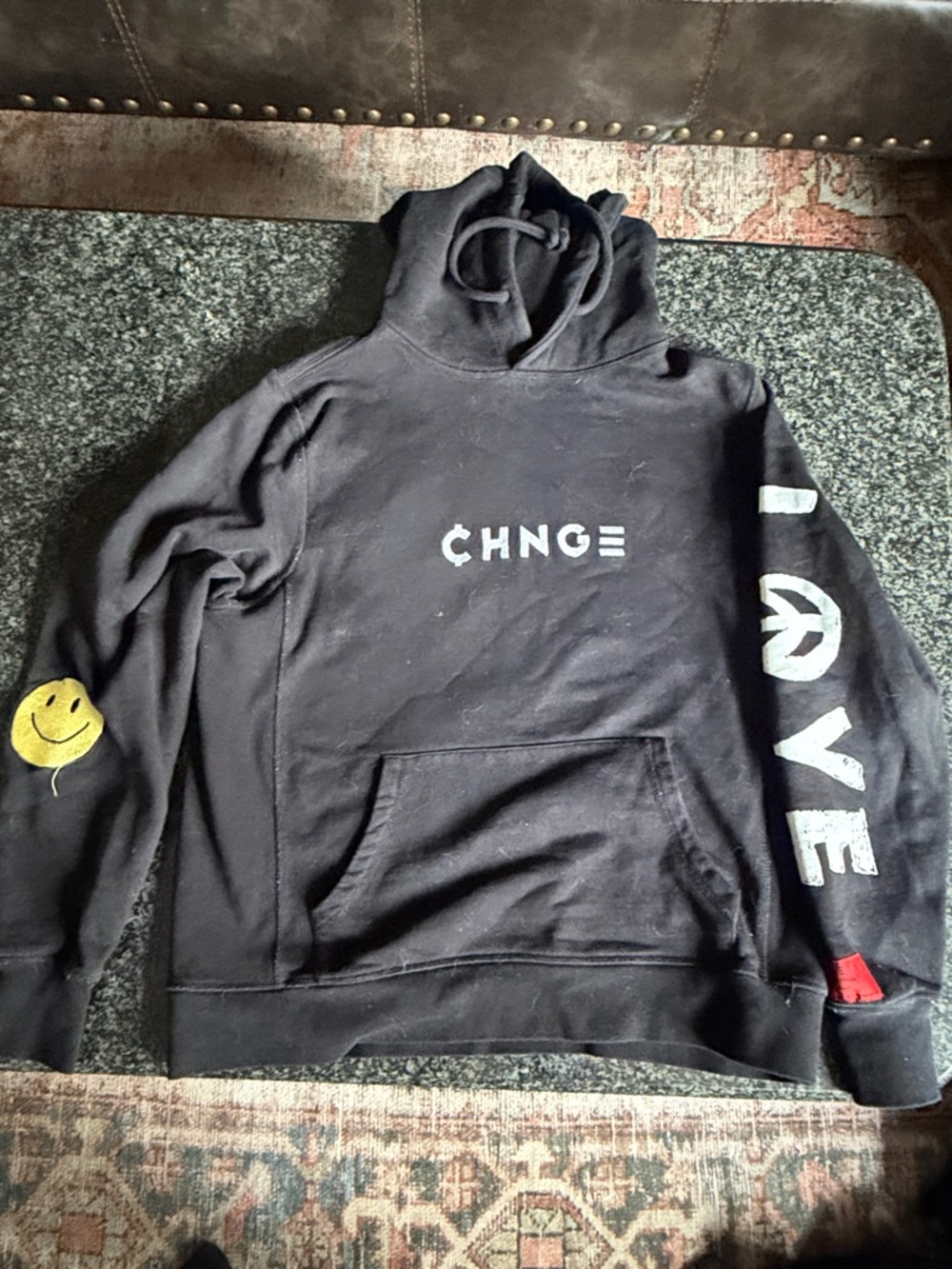 CHNGE Black Crewneck Hoodie with Graphic Sleeve and Smiley Detail